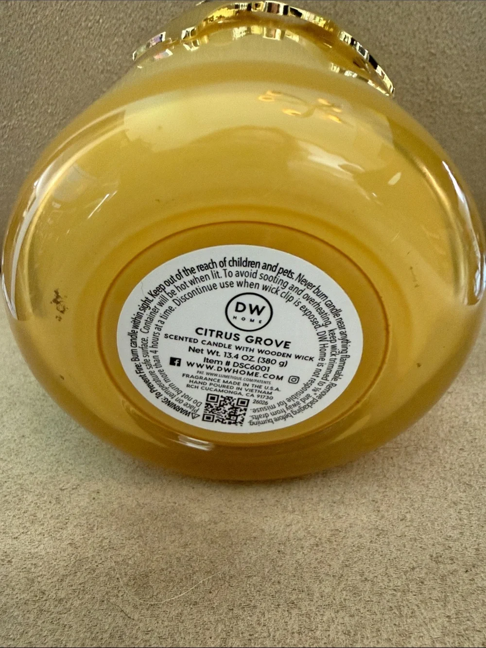 DW Home Yellow Scalloped Glass Wooden Wick Candle with a gold bow